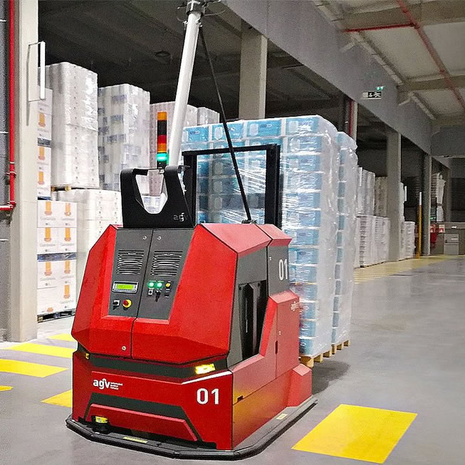 Automated Guided Vehicle (AGV) transporting pallets throughout a warehouse
